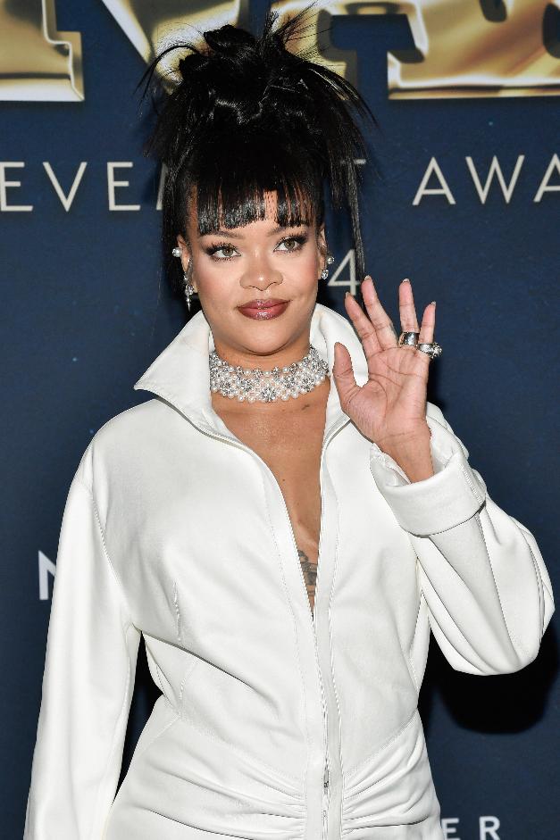 FILE - Rihanna attends the 38th annual Footwear News Achievement Awards at Cipriani South Street on Wednesday, Dec. 4, 2024, in New York. (Photo by Evan Agostini/Invision/AP, File)