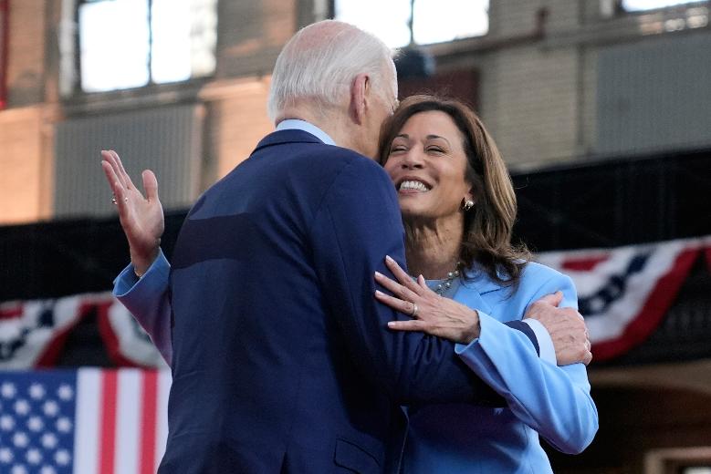 FILE - President Joe Biden hugs Vice President Kamala Harris during a campaign event at Girard College, May 29, 2024, in Philadelphia. (AP Photo/Evan Vucci, File)