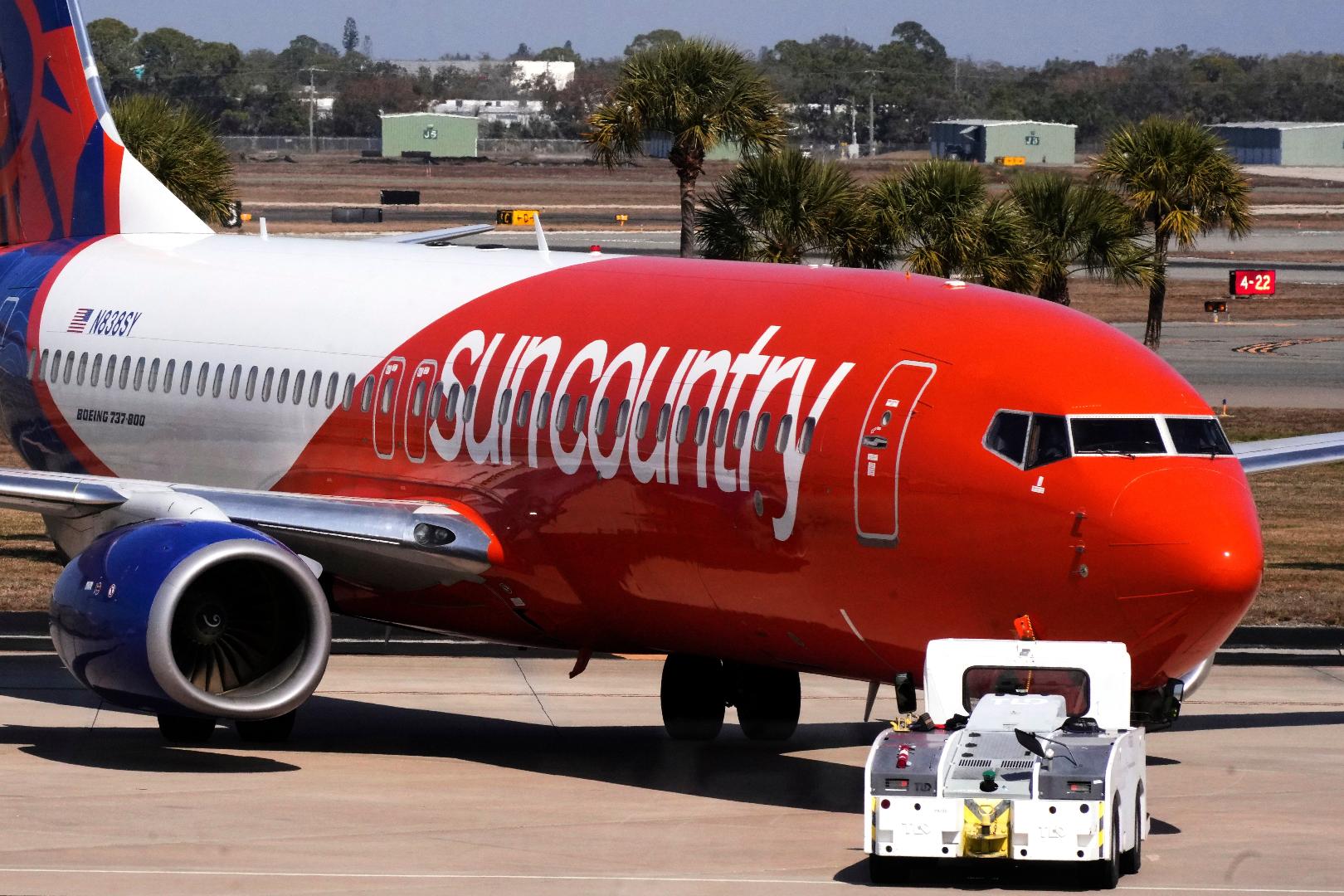 FILE - A Sun Country Airlines jet is pushed back from a gate at Sarasota-Bradenton International Airport in Sarasota, Fla., Friday, Feb. 13, 2026. (AP Photo/Gene J. Puskar,File)