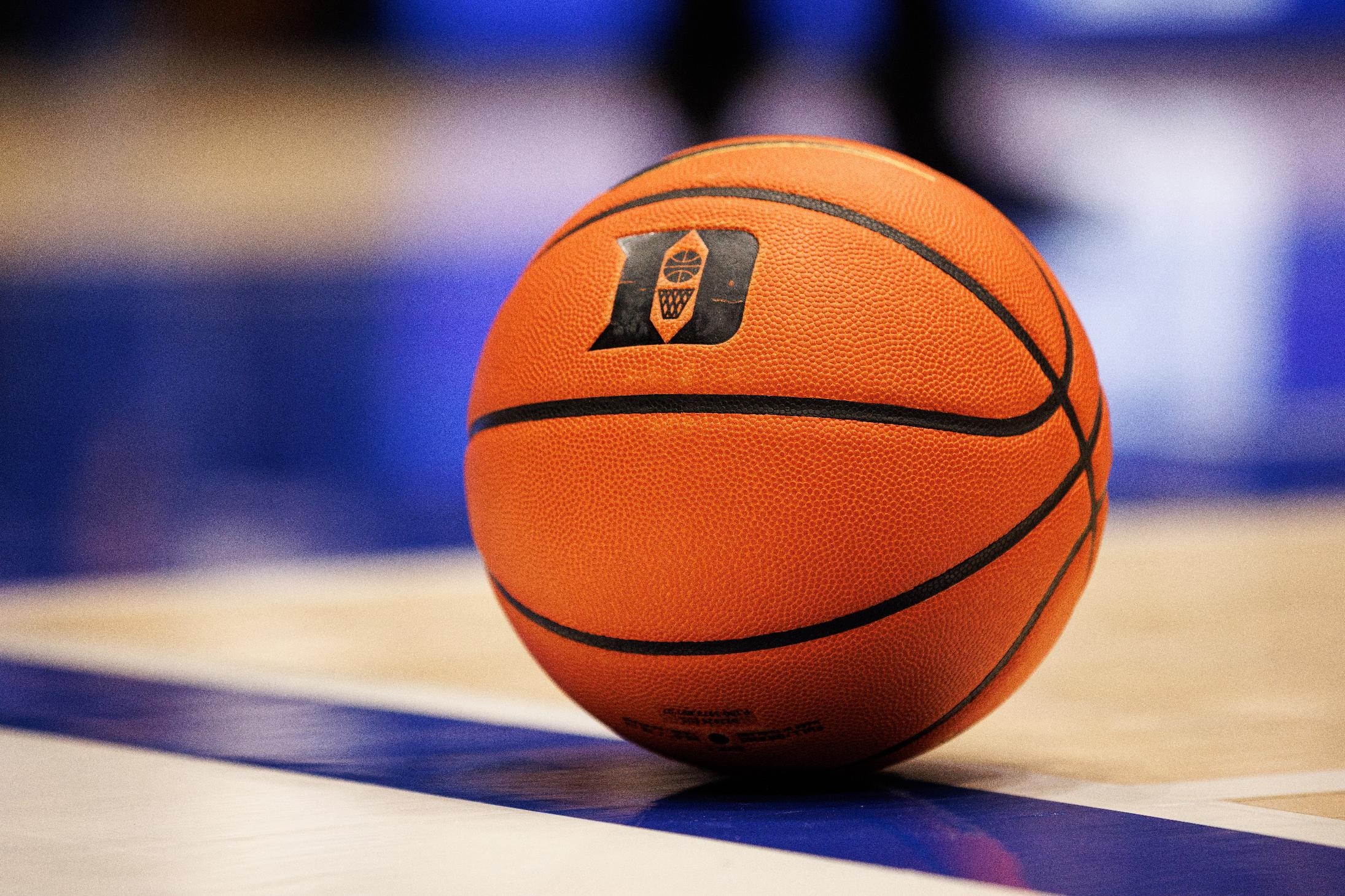 FILE - A basketball with the Duke logo sits on the court during a timeout in an NCAA college basketball game against in Durham, N.C., Dec. 16, 2025. (AP Photo/Ben McKeown, File)