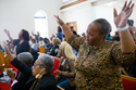 Carla Beard-Owens sings during service at Morningstar Baptist Church in Clairton, Pa., on Sunday, Oct. 19, 2025. (Quinn Glabicki/Pittsburgh's Public Source via AP)