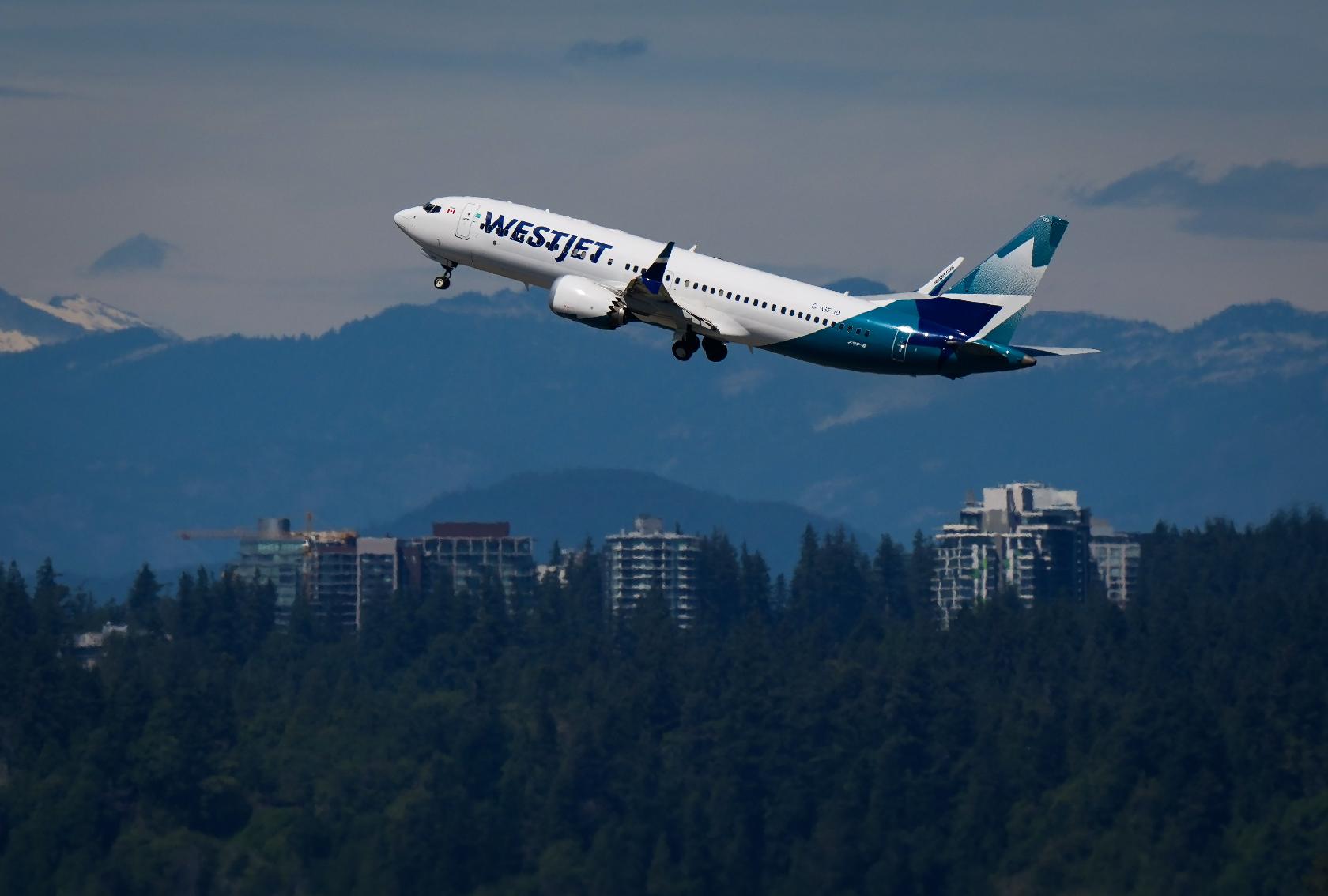 A WestJet Boeing 737 Max aircraft takes off from Vancouver International Airport in Richmond, British Columbia, Canada, on Friday, July 31, 2026. (Darryl Dyck/The Canadian Press via AP)