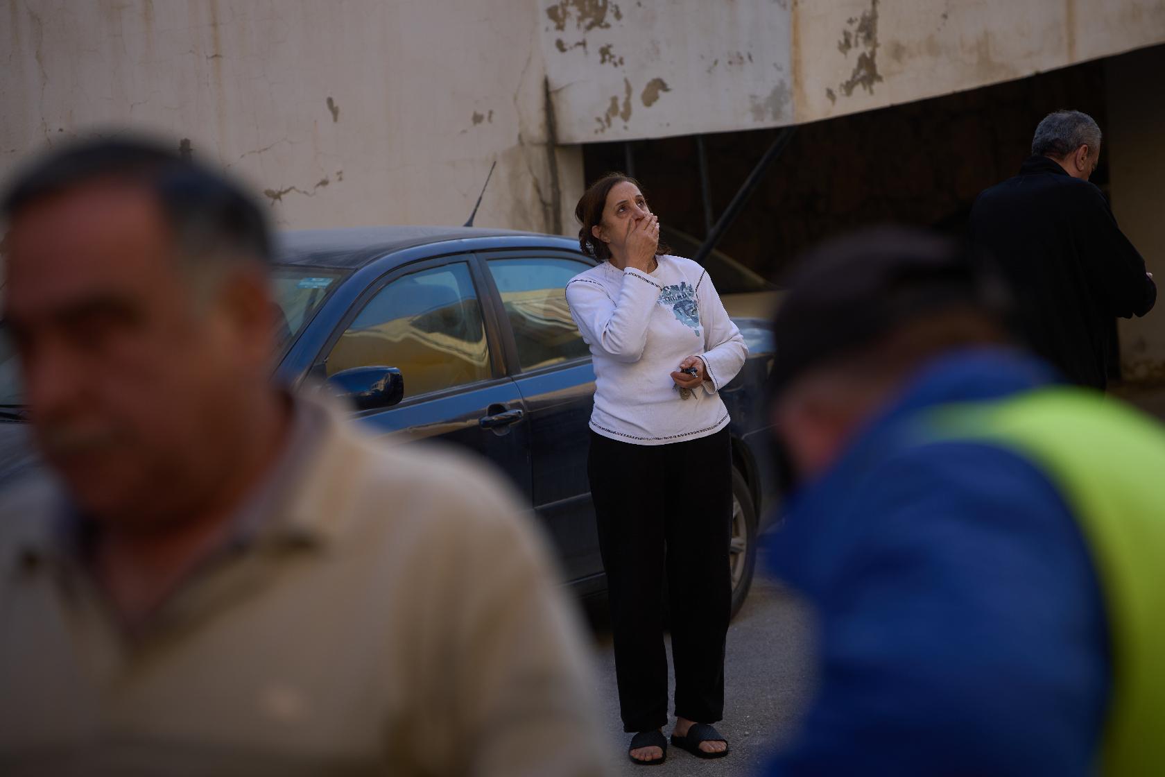 Nadine Naameh reacts as she looks at the damage to her home following an Israeli strike in the village of Ain Saadeh in the mountains east of Beirut, Lebanon, Monday, April 6, 2026. (AP Photo/Emilio Morenatti)