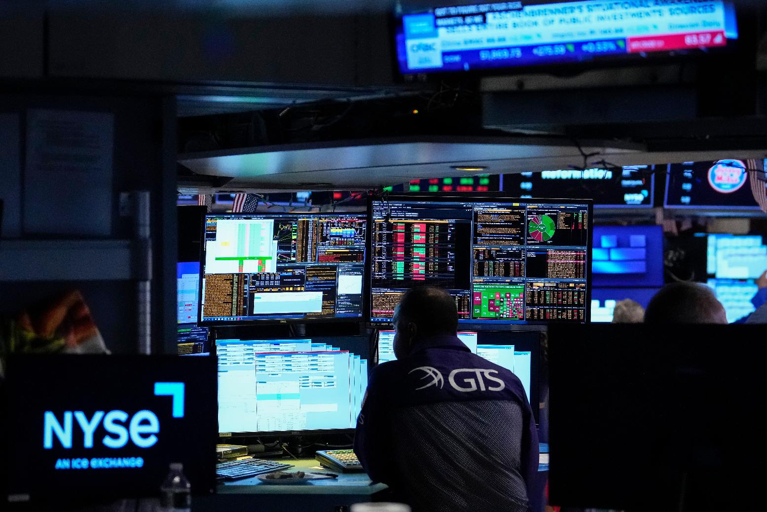 Specialist Dilip Patel works on the floor of the New York Stock Exchange, Thursday, July 30, 2026, in New York. (AP Photo/Yuki Iwamura)