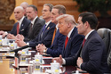 President Donald Trump listens as he meets with China's President Xi Jinping at the Great Hall of the People, Thursday, May 14, 2026, in Beijing. (AP Photo/Mark Schiefelbein)