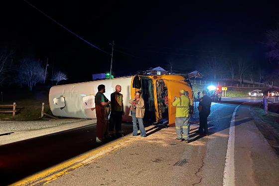 FILE - Emergency personnel respond to the scene of a bus crash, March 4, 2024, on West Virginia Route 16 in Calhoun County, W.Va. (WCHS TV via AP, File)