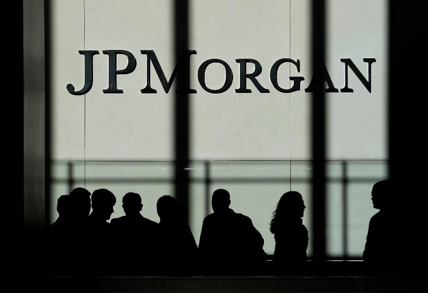 FILE - The JPMorgan Chase & Co. logo is displayed at their headquarters Oct. 21, 2013 in New York. (AP Photo/Seth Wenig, File)