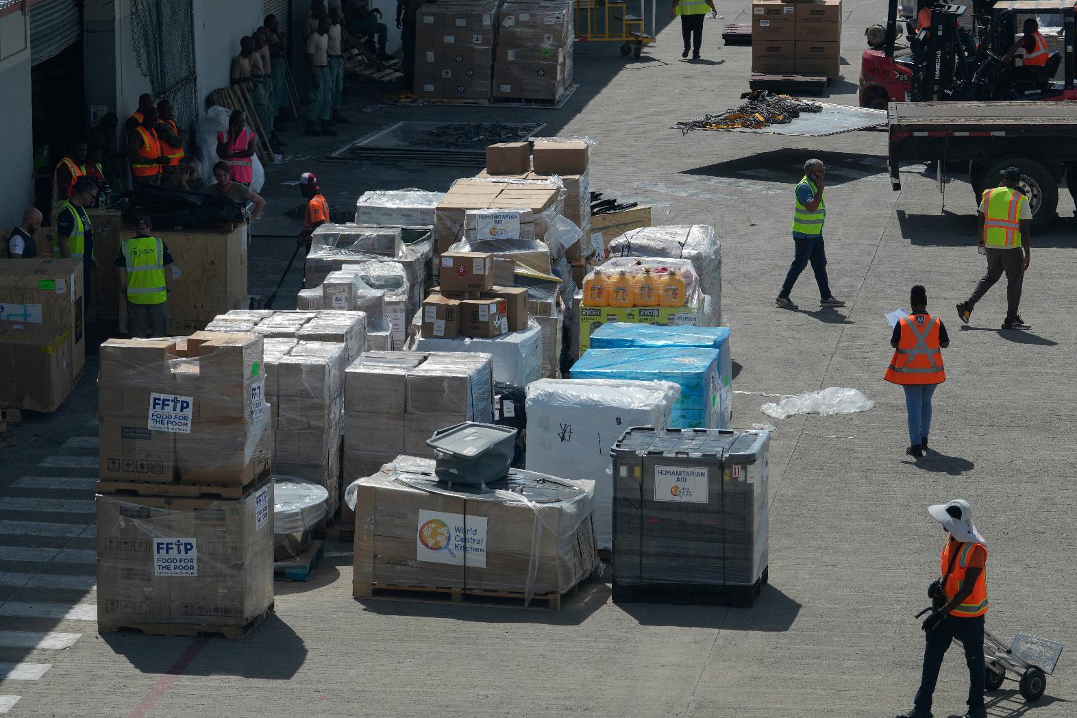 Humanitarian aid sits on the tarmac at the Norman Manley International Airport in Kingston, Jamaica, Saturday, Nov. 1, 2025, in the aftermath of Hurricane Melissa. (AP Photo/Matias Delacroix)