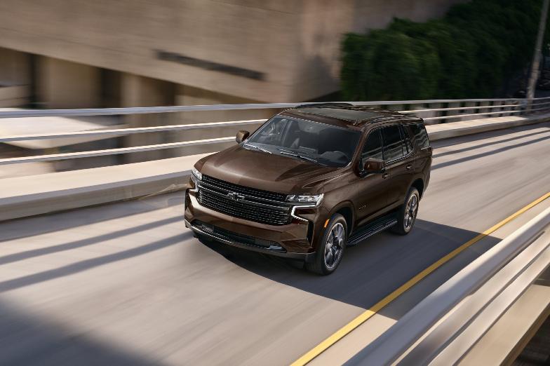 This photo provided by Chevrolet shows the 2023 Tahoe. The Tahoe is a capable vehicle for towing that can be outfitted with a lot of Chevy's latest technology features. (Courtesy of General Motors via AP)