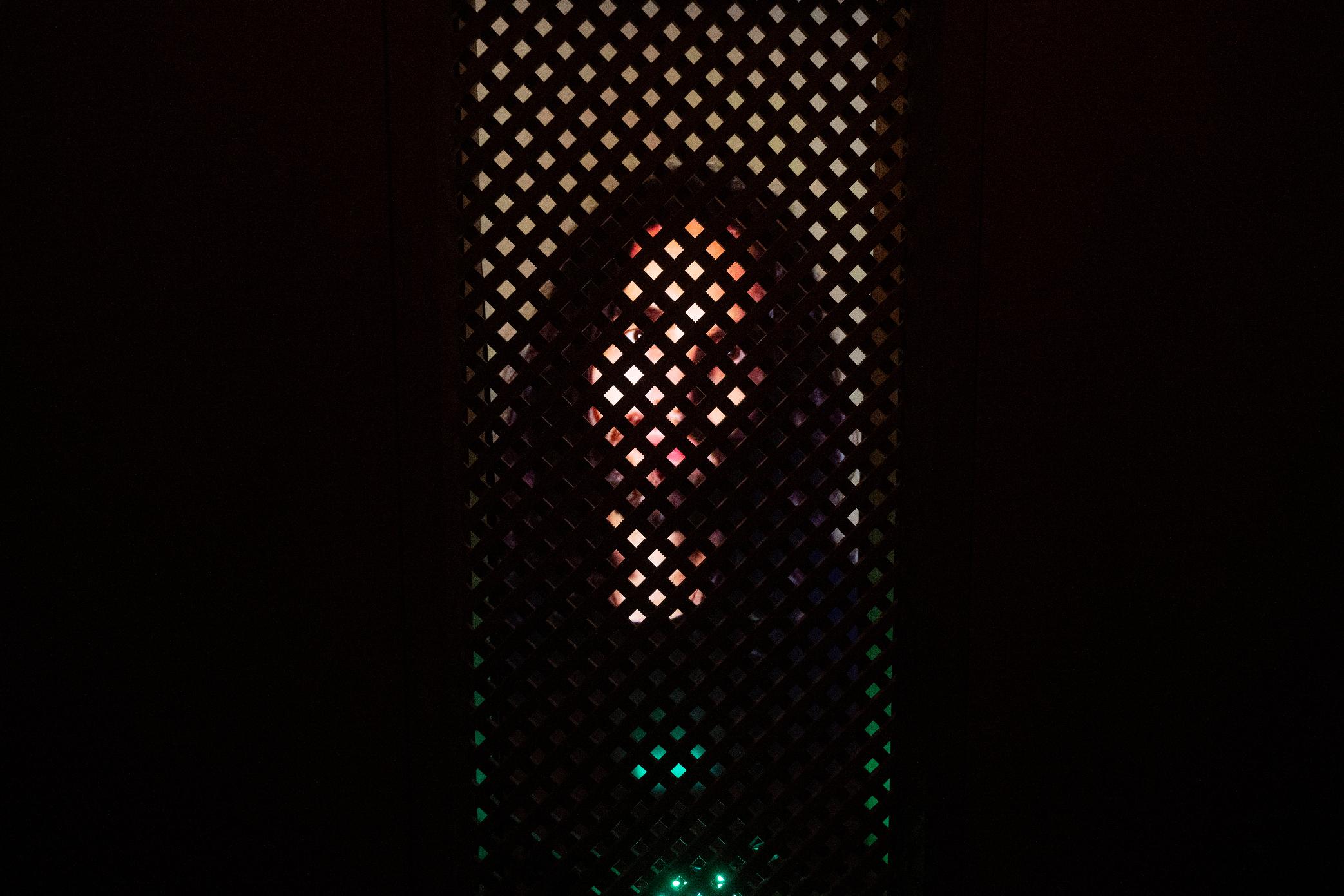 FILE - An experimental art installation with an AI Jesus entitled, Deus in Machina, installed in a confessional in St. Peter's Chapel in the old town of Lucerne, Switzerland, Aug. 25, 2024. (Urs Flueeler/Keystone via AP, File)