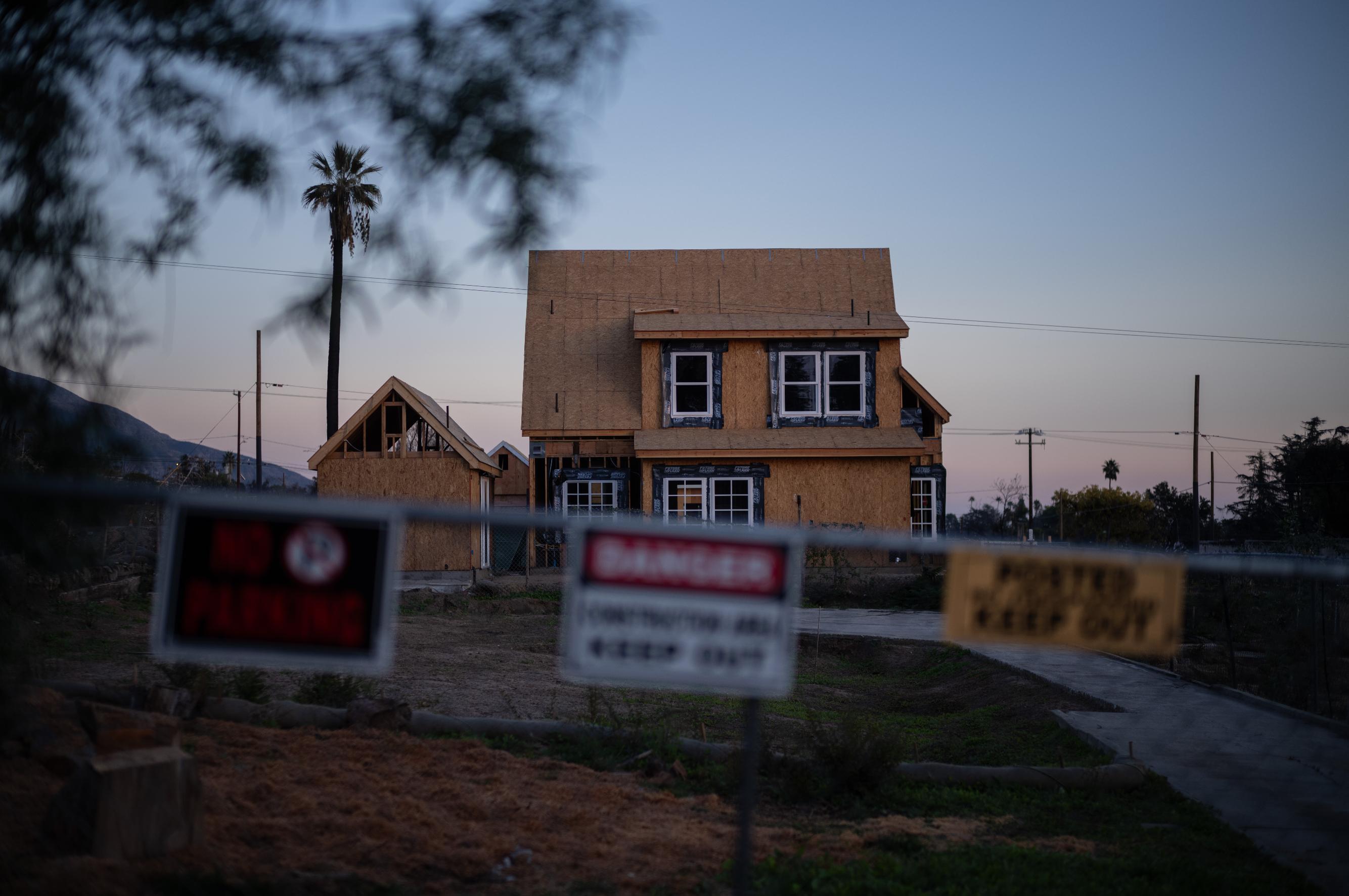 A home being rebuilt is seen, Dec. 3, 2025, in Altadena, Calif., months after the Eaton Fire. (AP Photo/Jae C. Hong)