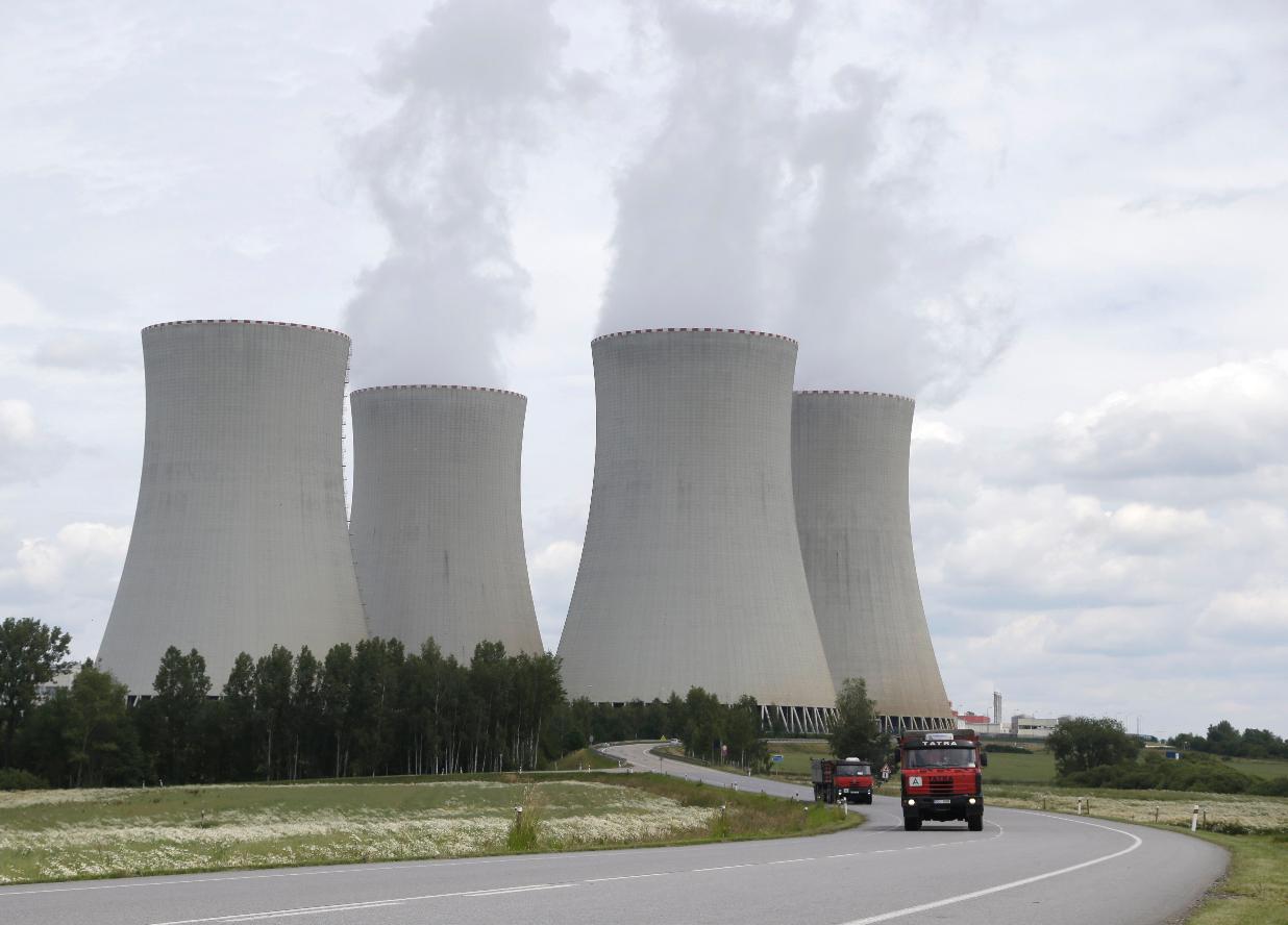 FILE - Smoke rises from the cooling towers of the nuclear power plant Temelin near the town of Tyn nad Vltavou, Czech Republic, June 25, 2015. (AP Photo/Petr David Josek, File)