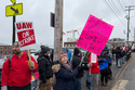 Strikers picketing outside Bath Iron Works in Bath, Maine, on Monday, May 23, 2026. (AP Photo/Rodrique Ngowi)
