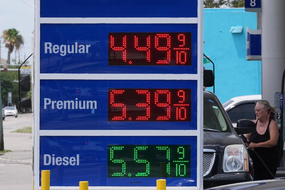 Gas prices are displayed at a Marathon gas station in Miami, Tuesday, May 12, 2026. (AP Photo/Marta Lavandier)