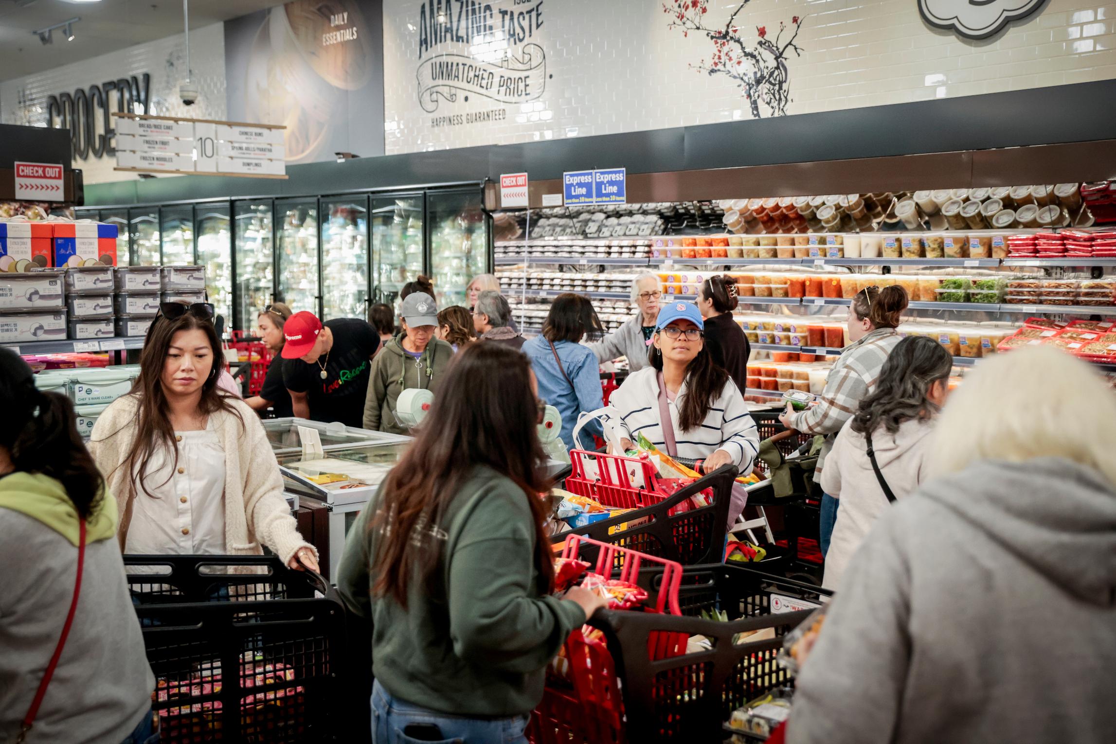 Shoppers navigate packed aisles in the new H Mart, in Dublin, Calif., Thursday, March 26, 2026. (Brontë Wittpenn/San Francisco Chronicle via AP)