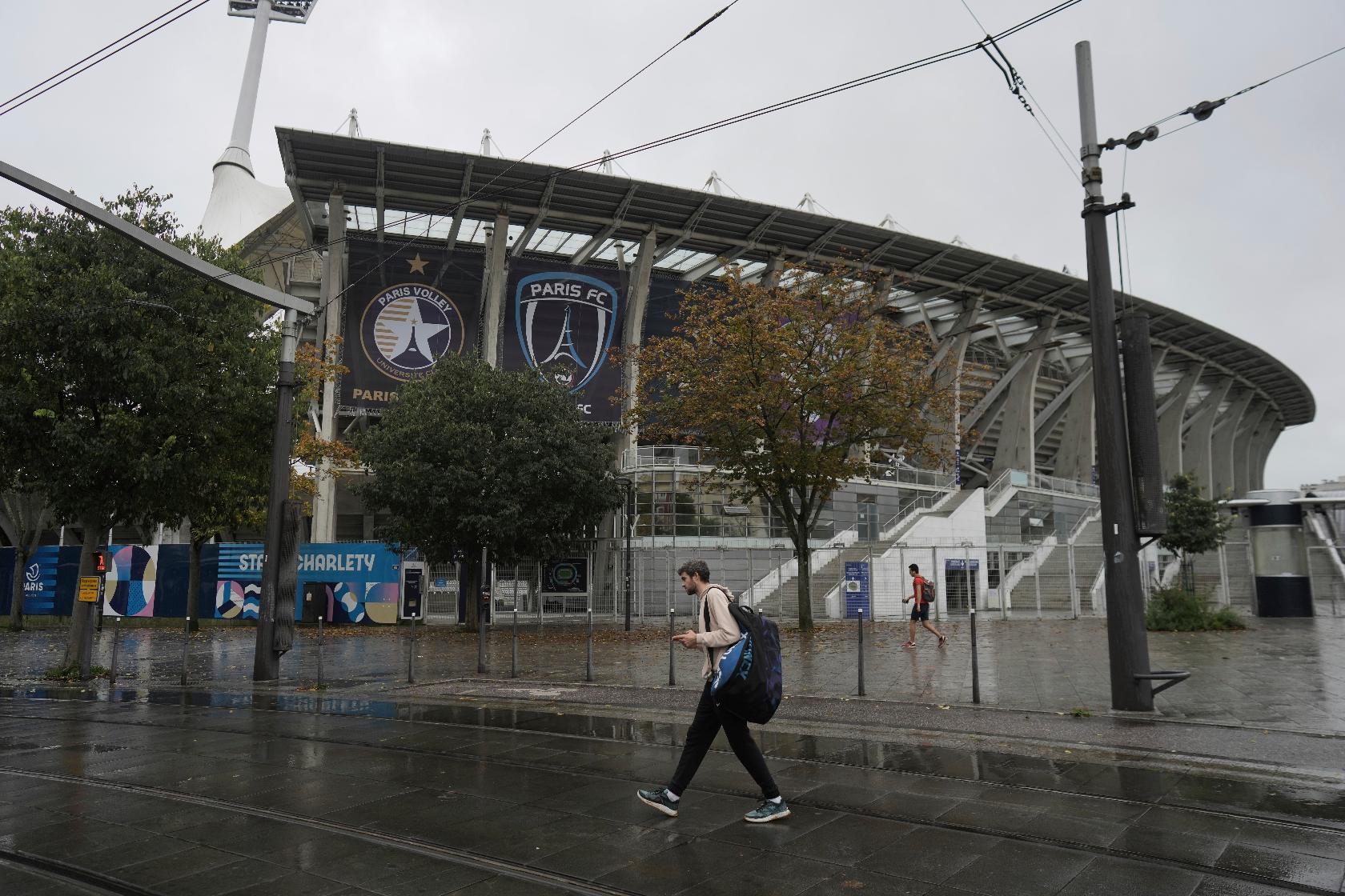 The Paris FC soccer club banner is seen outside the Charlety stadium in Paris, France, Thursday, Oct.17, 2024. (AP Photo/Thibault Camus)