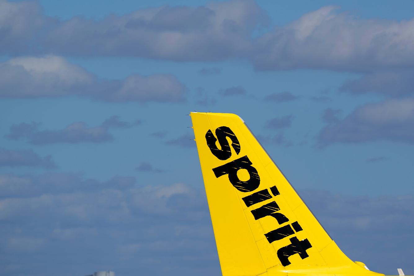 FILE - The tail of a Spirit Airlines Airbus A320 is shown as the plane prepares to take off from Fort Lauderdale-Hollywood International Airport, Jan. 19, 2021, in Fort Lauderdale, Fla. (AP Photo/Wilfredo Lee, File)