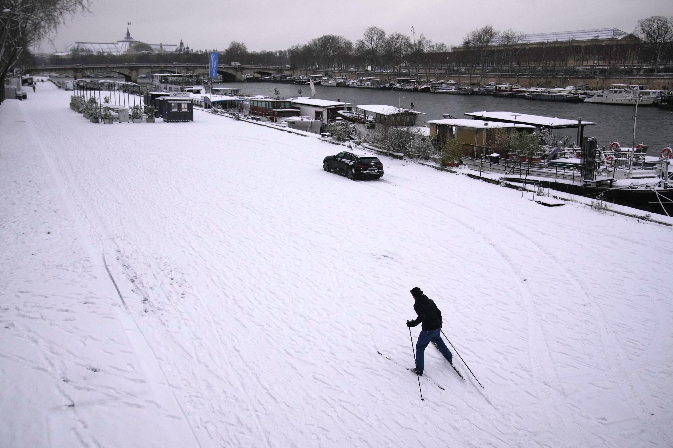 Snow and ice ground flights, choke highways in parts of Europe
