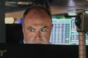 Trader Derek Orth works on the floor of the New York Stock Exchange, Thursday, April 30, 2026. (AP Photo/Richard Drew)
