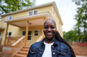 Home owner Phileena Daniel poses for a photo in Langston Park, April 13, 2026, in Atlanta. (AP Photo/Mike Stewart)