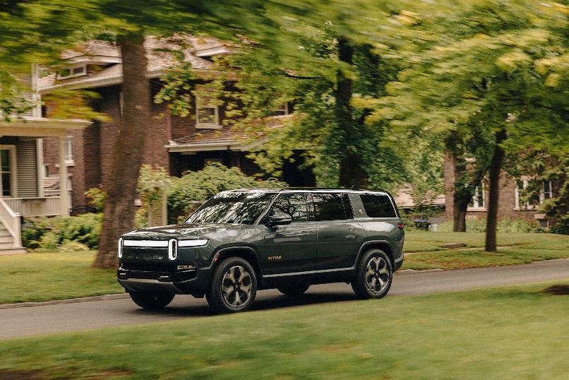 This photo provided by Rivian shows the 2024 R1S. The R1S is ready for adventure thanks to a potential range of 400 miles and up to 835 horsepower. (Nolis Anderson/Courtesy of Rivian Automotive via AP)