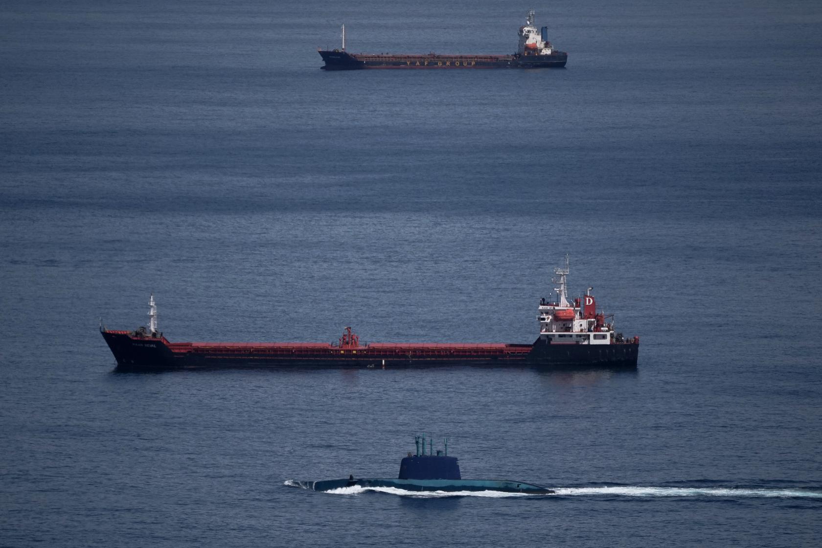 An Israeli submarine is seen in the Haifa Bay , northern Israel, Saturday, Feb. 28, 2026 after Israel issued a nationwide alert following its strikes on Iran.(AP Photo/Leo Correa)