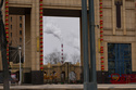 A chimney of a coal-fired power plant is visible near a residential complex in Datong, China, Saturday, March 14, 2026. (AP Photo/Ng Han Guan)