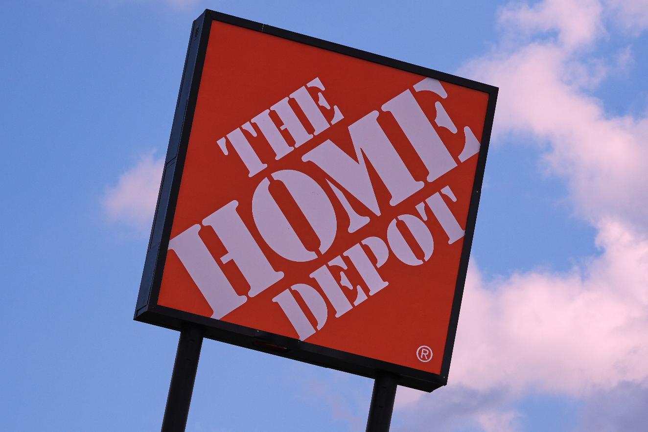 FILE - The Home Depot logo is displayed on a sign outside a store, on Aug. 14, 2025, in Manchester, N.H. (AP Photo/Charles Krupa, File)