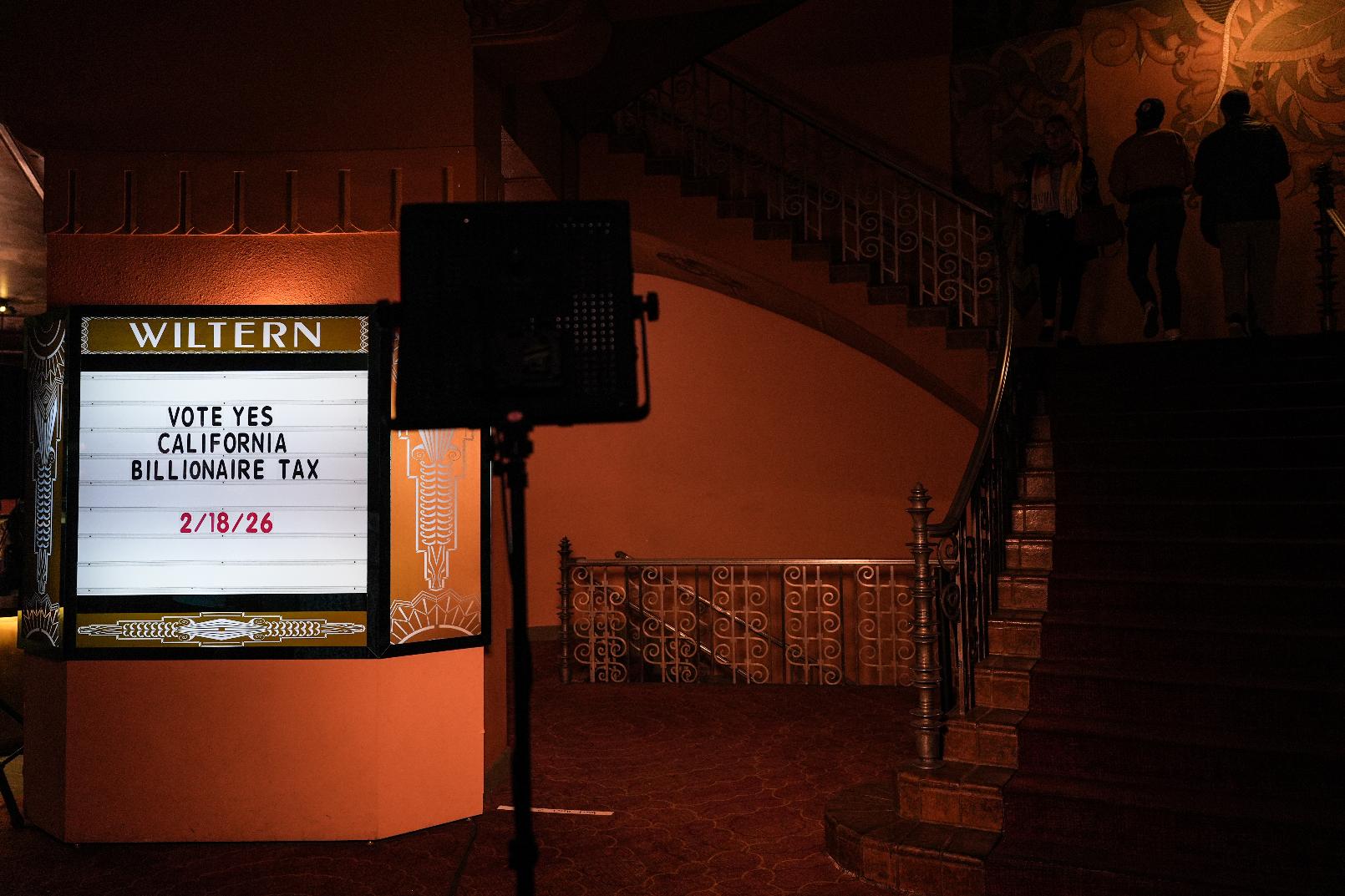 A message is displayed on a letter board at a campaign event for a proposed "billionaires tax" in Los Angeles, Wednesday, Feb. 18, 2026. (AP Photo/Jae C. Hong)