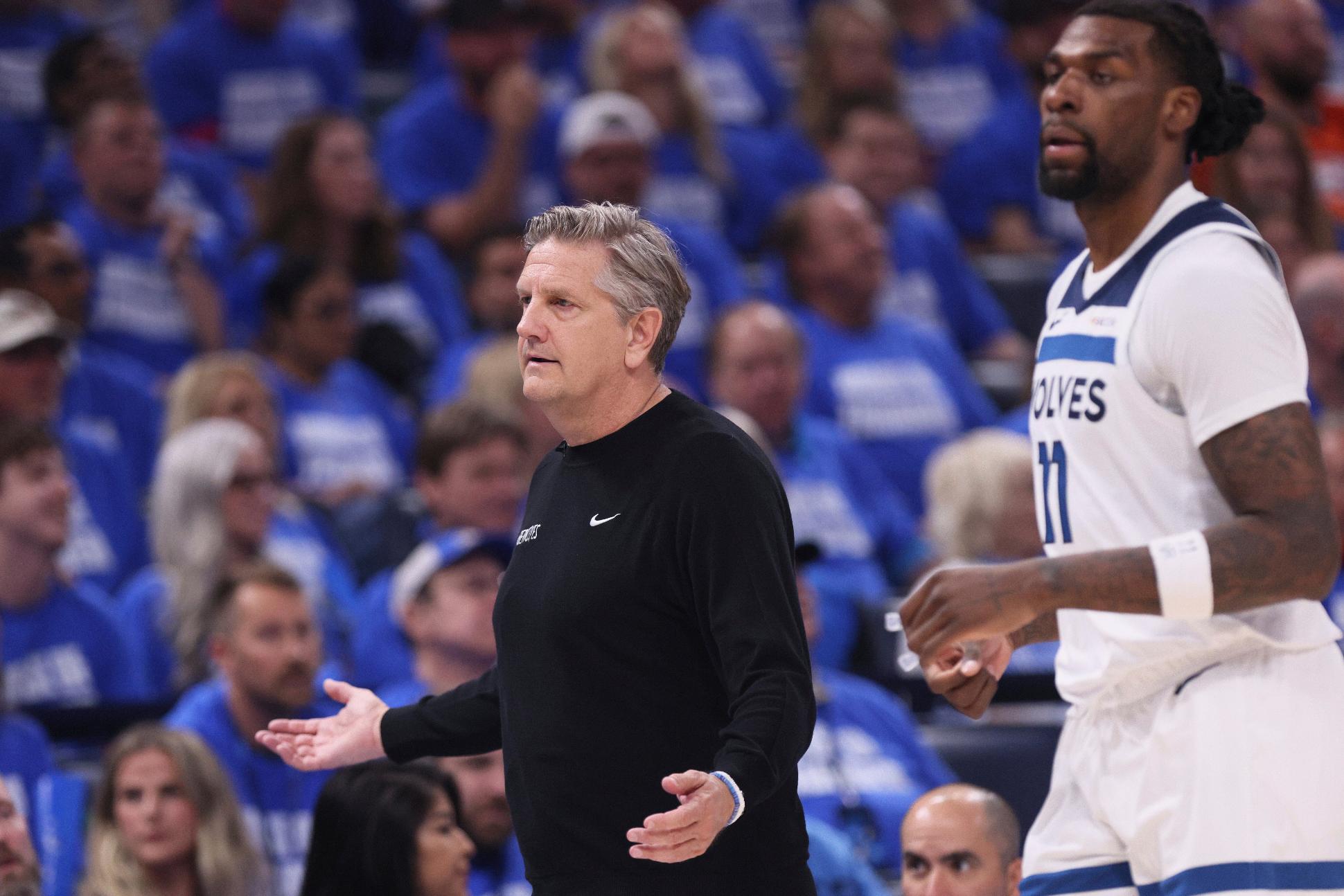 Minnesota Timberwolves head coach Chris Finch reacts next to center Naz Reid (11) during the first half of Game 5 of the Western Conference finals of the NBA basketball playoffs against the Oklahoma City Thunder, Wednesday, May 28, 2025, in Oklahoma City. (AP Photo/Nate Billings)