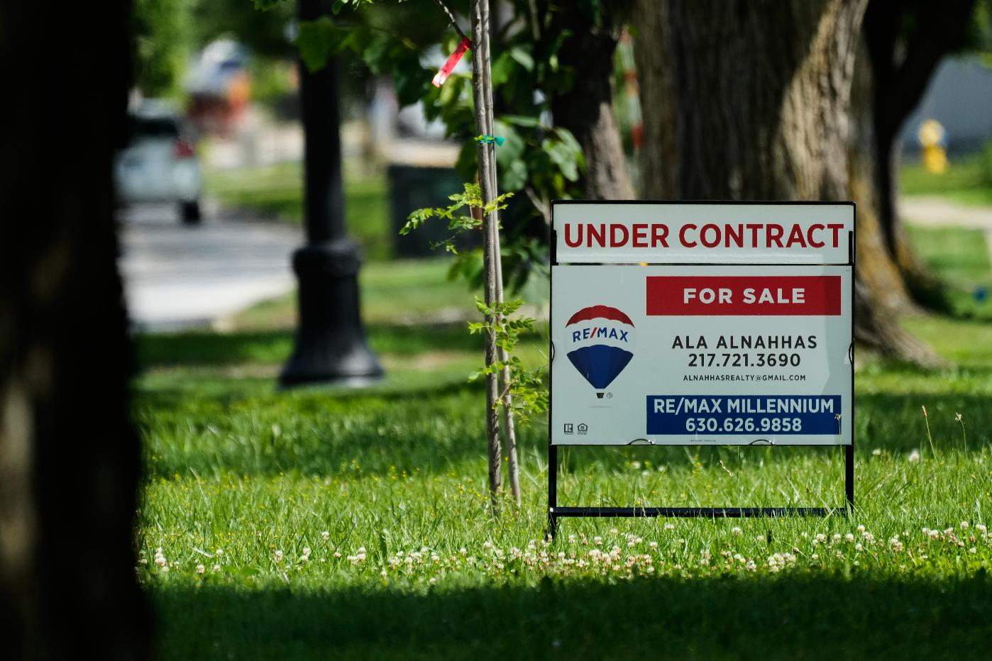 A under contract for home sale sign is seen outside of a home in Niles, Ill., Thursday, June 25, 2026. (AP Photo/Nam Y. Huh)