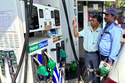 A commuter monitors the meter as an attendant refuels his vehicle at a filling station in New Delhi, India, Friday, May 15, 2026. (AP Photo/Shonal Ganguly)
