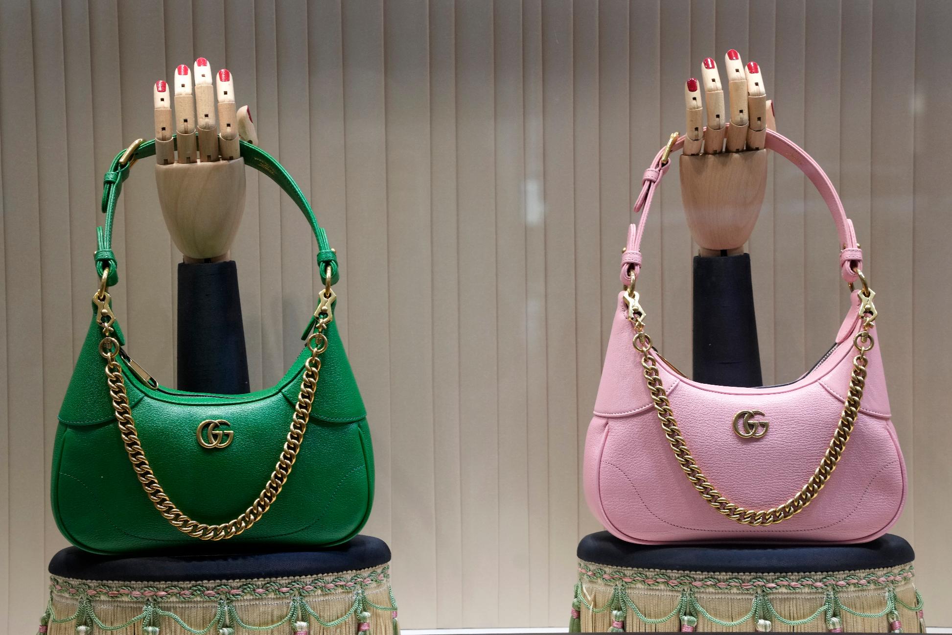 FILE - These are Gucci bags in the window of a Gucci store in Pittsburgh on Monday, Jan. 30, 2023. (AP Photo/Gene J. Puskar, File)