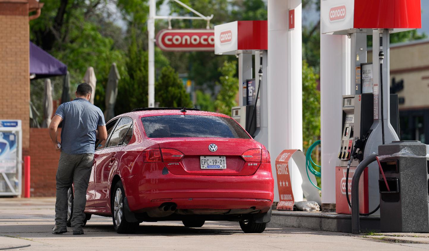 A motorist parks near fuel pumps at a service station Thursday, June 22, 2023, in Denver. The national average for gas prices stood at about $3.78 a gallon on Tuesday — about 25 cents higher than that seen one month ago, according to motor club AAA. (AP Photo/David Zalubowski)