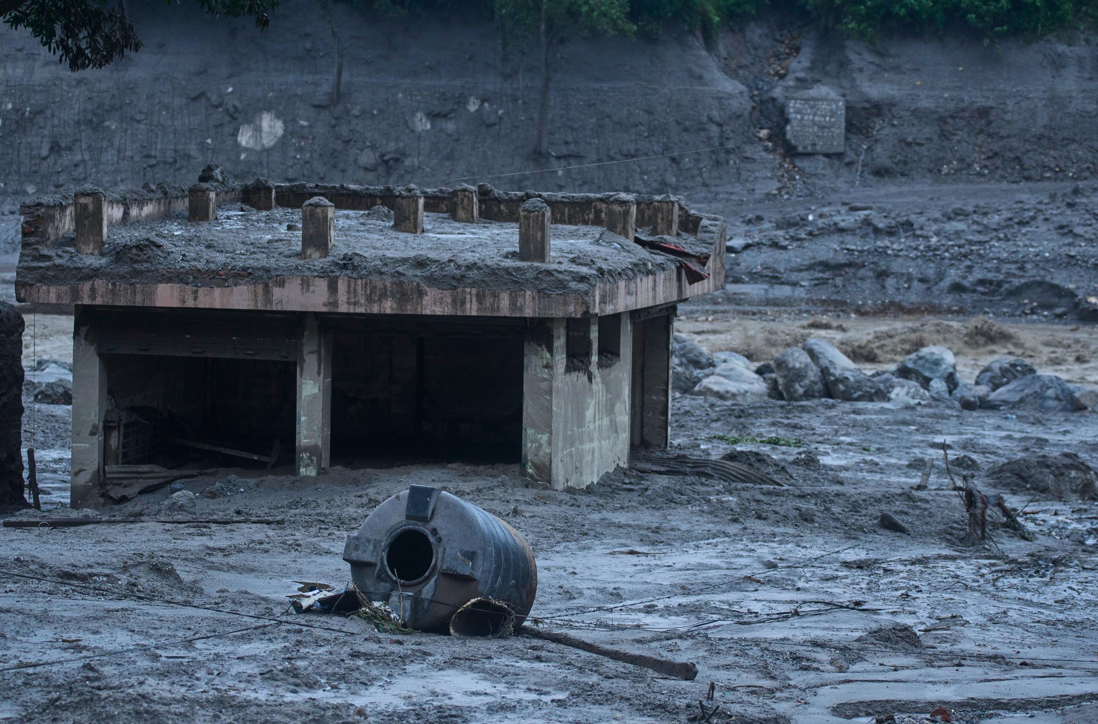 Damage is seen in the aftermath of flash floods in Devighat in the Nuwakot district in Nepal, Thursday, Aug. 27, 2026. (AP Photo/Niranjan Shrestha)