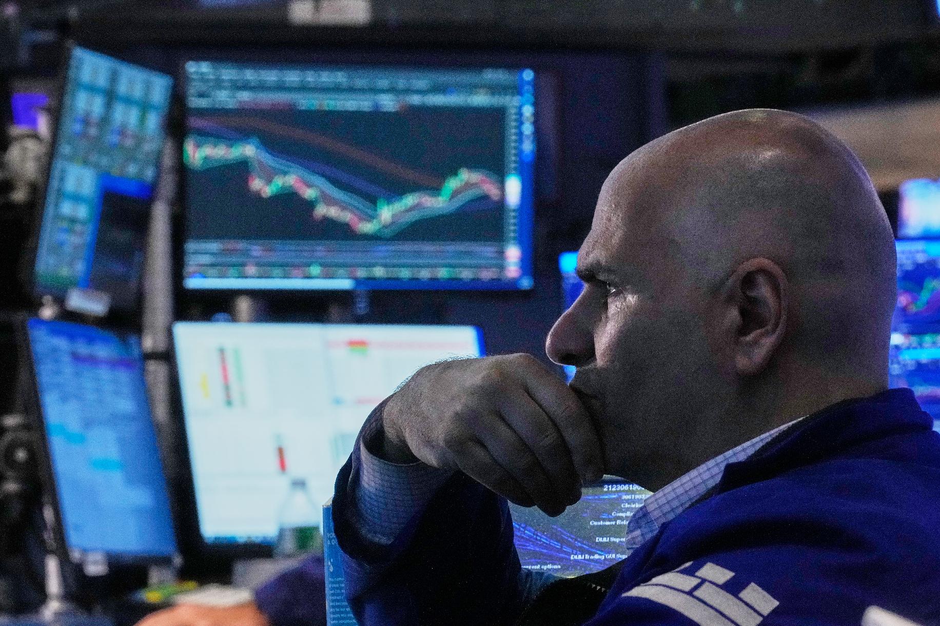 Specialist Philip Finale works on the floor of the New York Stock Exchange, Friday, June 26, 2026. (AP Photo/Richard Drew)