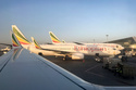 FILE - Ethiopian Airlines planes are parked at Bole International Airport in Addis Ababa, Ethiopia, Monday, Feb. 11, 2019. (AP Photo/Ben Curtis, File)
