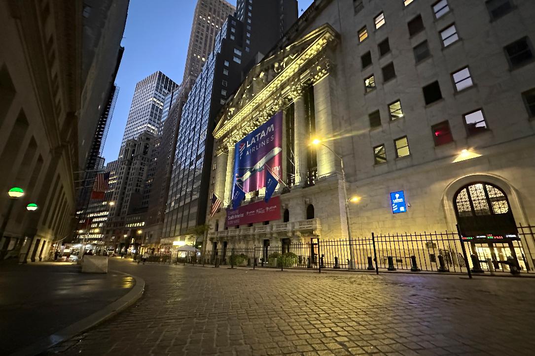 A banner for LATAM Airlines hangs from the front of the New York Stock Exchange on Tuesday, Oct. 22, 2024, in New York. (AP Photo/Peter Morgan)