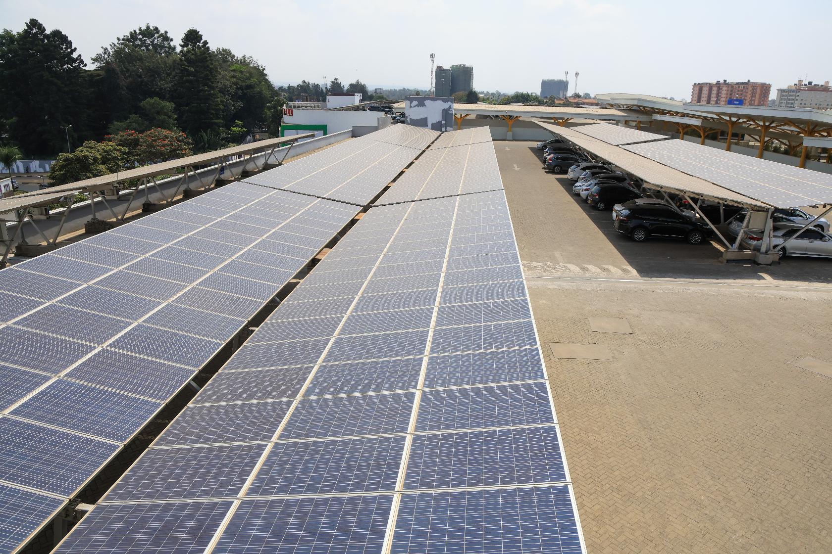 Solar panels cover the parking lot of Garden City Mall in Nairobi, Kenya, Tuesday, July 16, 2026. (AP Photo/Andrew Kasuku)