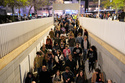 People enter an underground parking garage as sirens warn of an incoming missile fired from Yemen in Tel Aviv, Israel, Saturday, April 4, 2026. (AP Photo/Maya Levin)