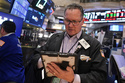 Trader Edward Curran works on the floor of the New York Stock Exchange, Monday, June 1, 2026. (AP Photo/Richard Drew)
