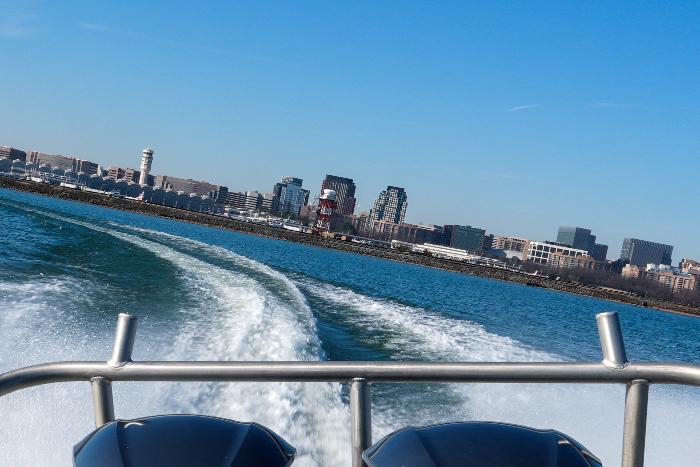 Ronald Reagan Washington National Airport is seen as Metropolitan Police Department diver Jeffrey Leslie pilots a boat along the Potomac River, Thursday, Jan. 22, 2026, in Washington. (AP Photo/Julia Demaree Nikhinson)