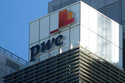 FILE - Signage appears on the Australian head office building of PricewaterhouseCoopers in Sydney, Monday, June 26, 2023. (AP Photo/Rick Rycroft, File)