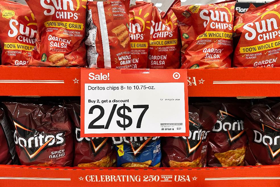 A sale information sign is displayed at a grocery store in Wheeling, Ill., Thursday, June 25, 2026. (AP Photo/Nam Y. Huh)