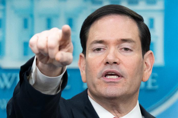 Secretary of State Marco Rubio gestures during a press briefing at the White House in Washington, Tuesday, May 5, 2026. (AP Photo/Mark Schiefelbein)