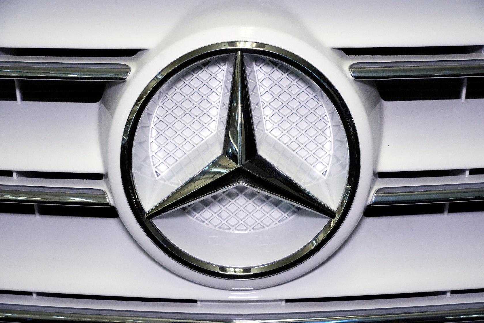 FILE - A Mercedes Benz logo is displayed on a vehicle at the Pittsburgh International Auto Show in Pittsburgh, Feb. 14, 2025. (AP Photo/Gene J. Puskar, File)