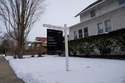A for sale sign is posted outside a home Monday, Feb. 9, 2026, in Chicago. (AP Photo/Erin Hooley)