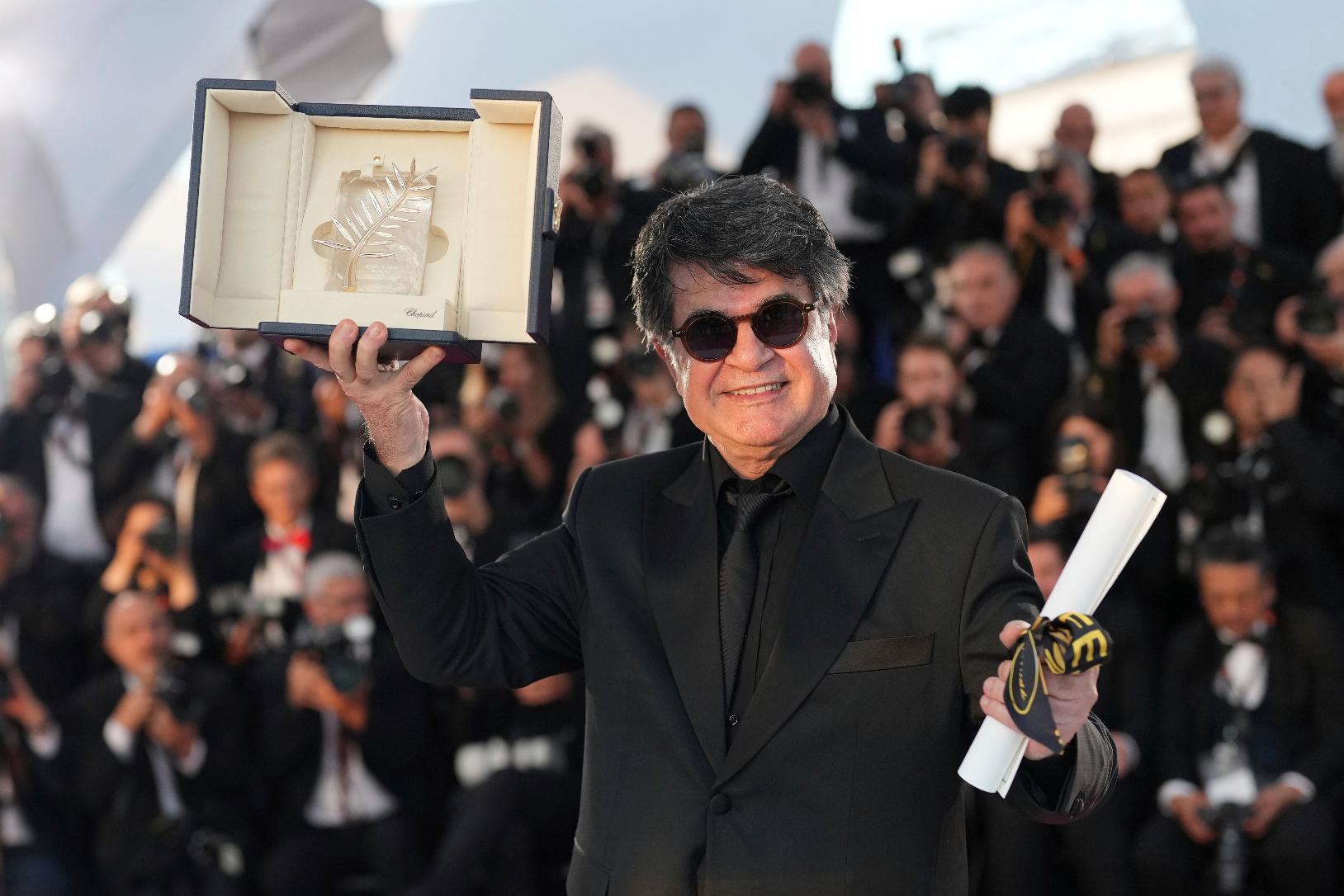Director Jafar Panahi, winner of the Palme d'Or for the film 'It Was Just an Accident', poses for photographers at the awards ceremony photo call at the 78th international film festival, Cannes, southern France, Saturday, May 24, 2025. (AP Photo/Natacha Pisarenko)