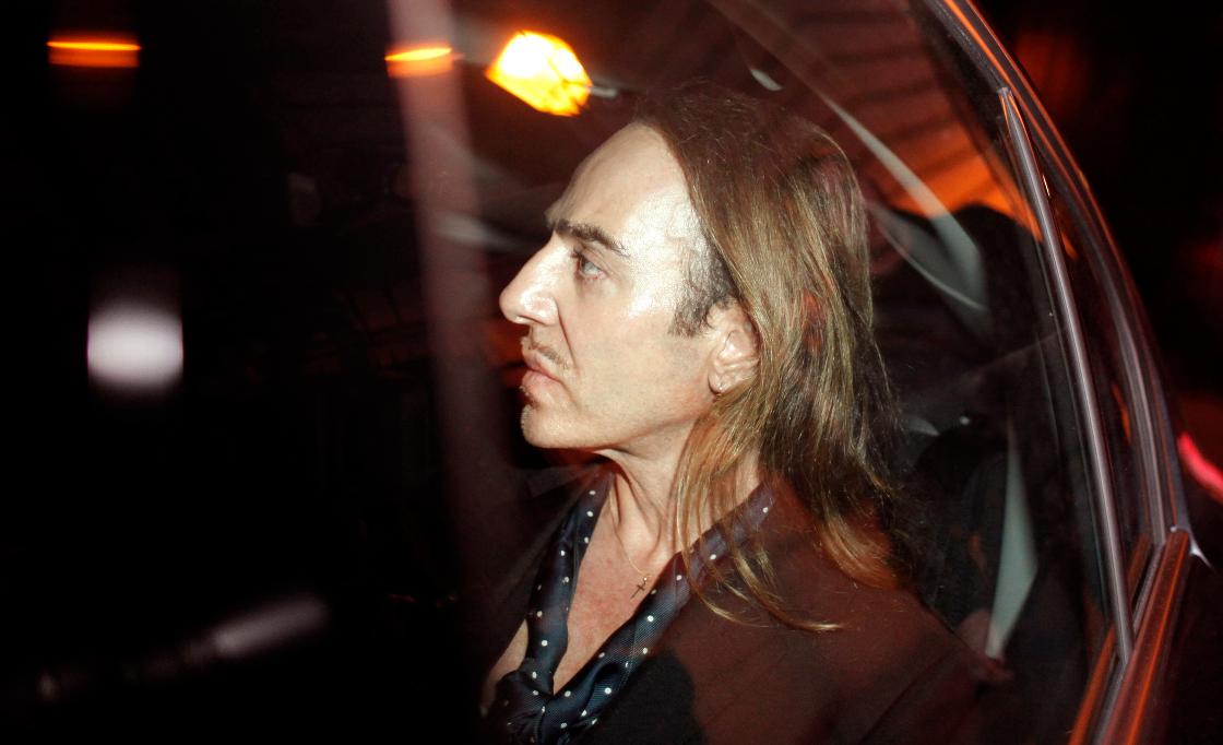FILE - In this June 22, 2011 file photo John Galliano leaves a Paris court house, June 2011. (AP Photo/Thibault Camus, File)