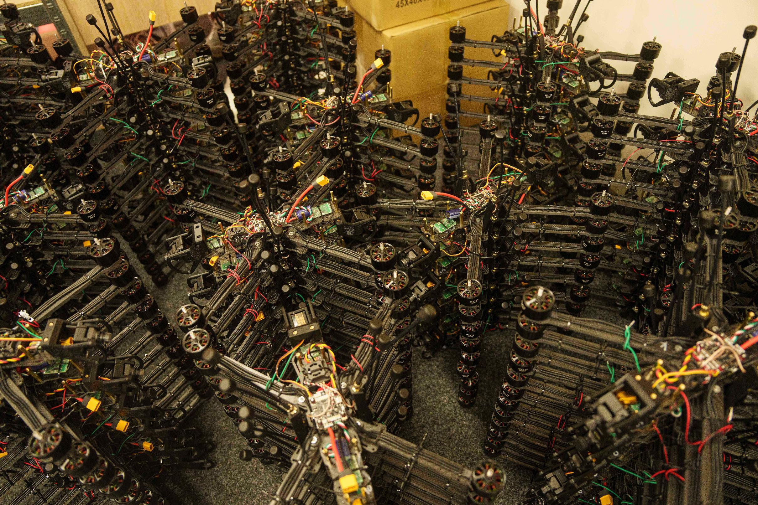 FILE - FPV drones are seen in a storage of the workshop of "General Cherry" company in Ukraine, on Dec. 4, 2025. (AP Photo/Evgeniy Maloletka, File)